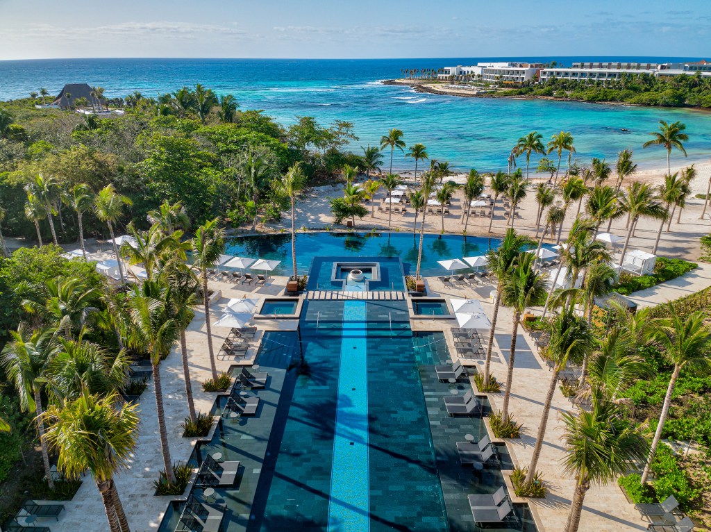 Conrad Tulum Riviera Maya aerial view of pools and coastline