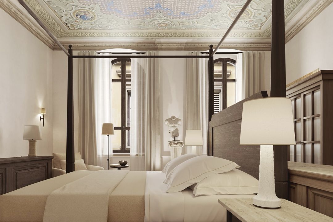 La Réserve Firenze bedroom and historic decorative ceiling