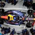 Overhead view of an Oracle Red Bull Racing car surrounded by pit crew
