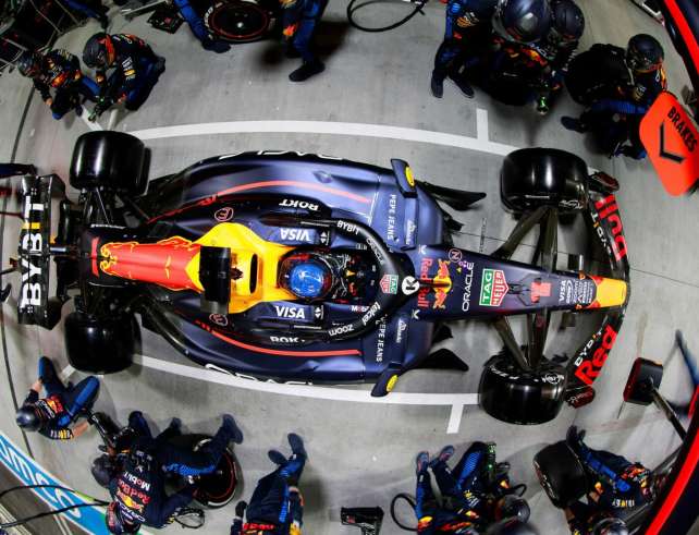 Overhead view of an Oracle Red Bull Racing car surrounded by pit crew